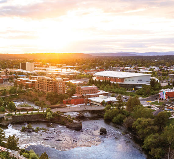 An aerial view of the Spokane River running through downtown Spokane.